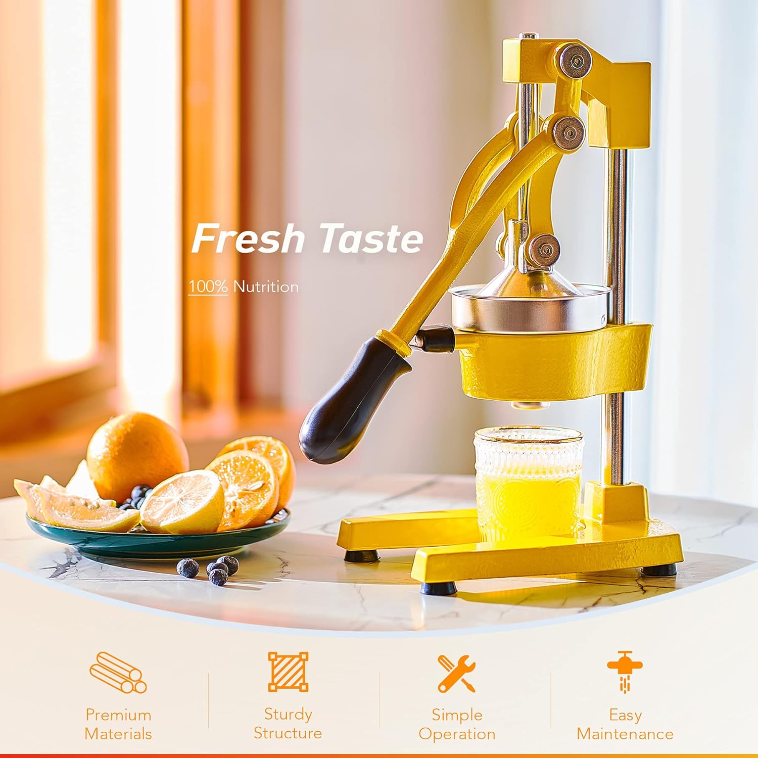Yellow manual juicer with oranges and a glass of juice on a light background