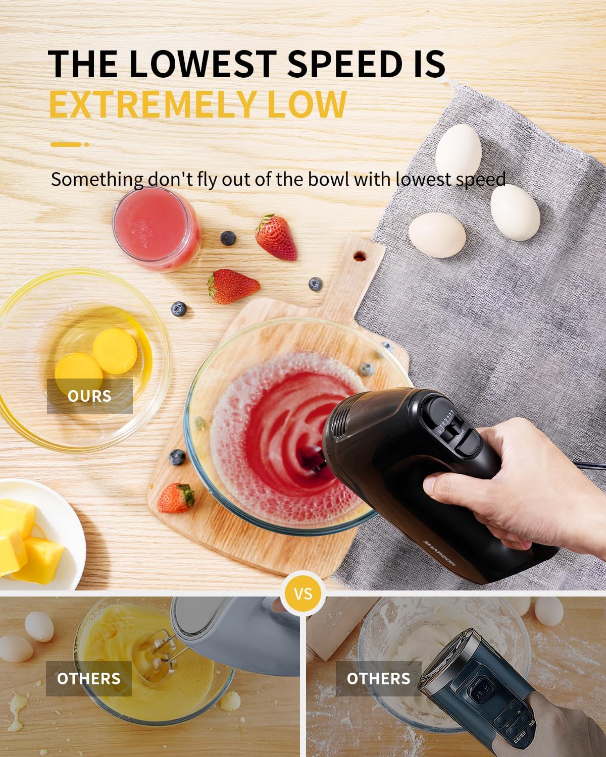 Product demonstration of a hand mixer with text about lowest speed performance on a wooden surface.