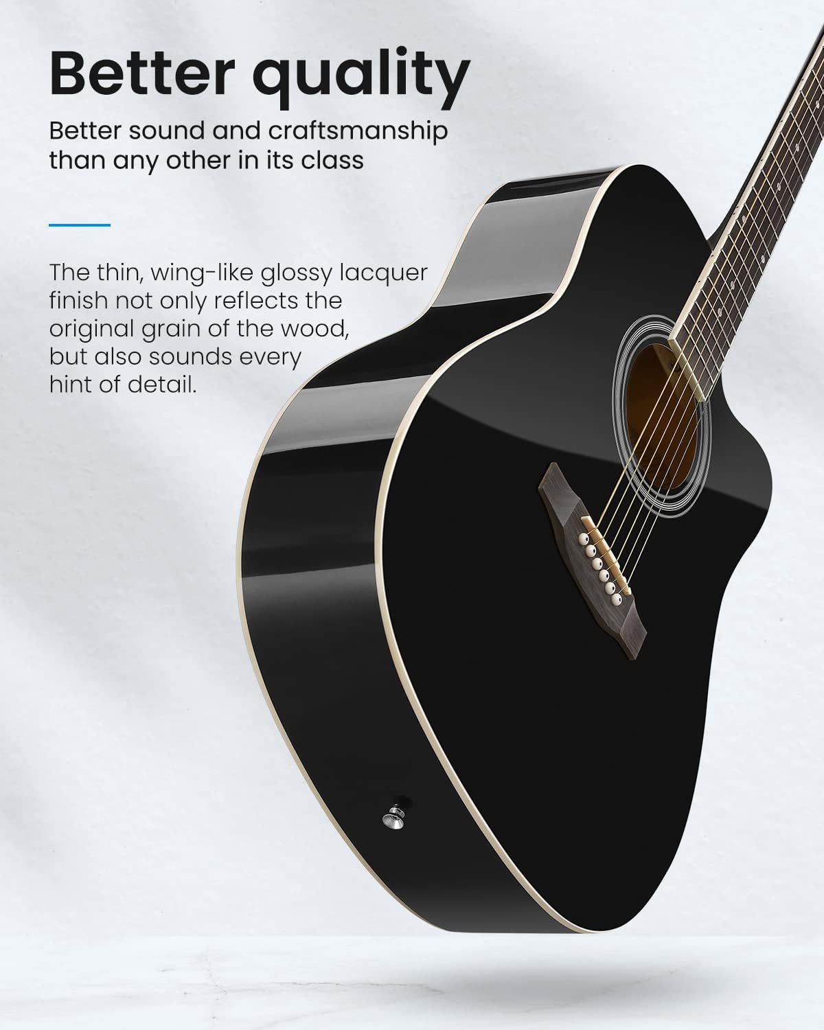 Black acoustic guitar with text highlighting better quality and sound craftsmanship.