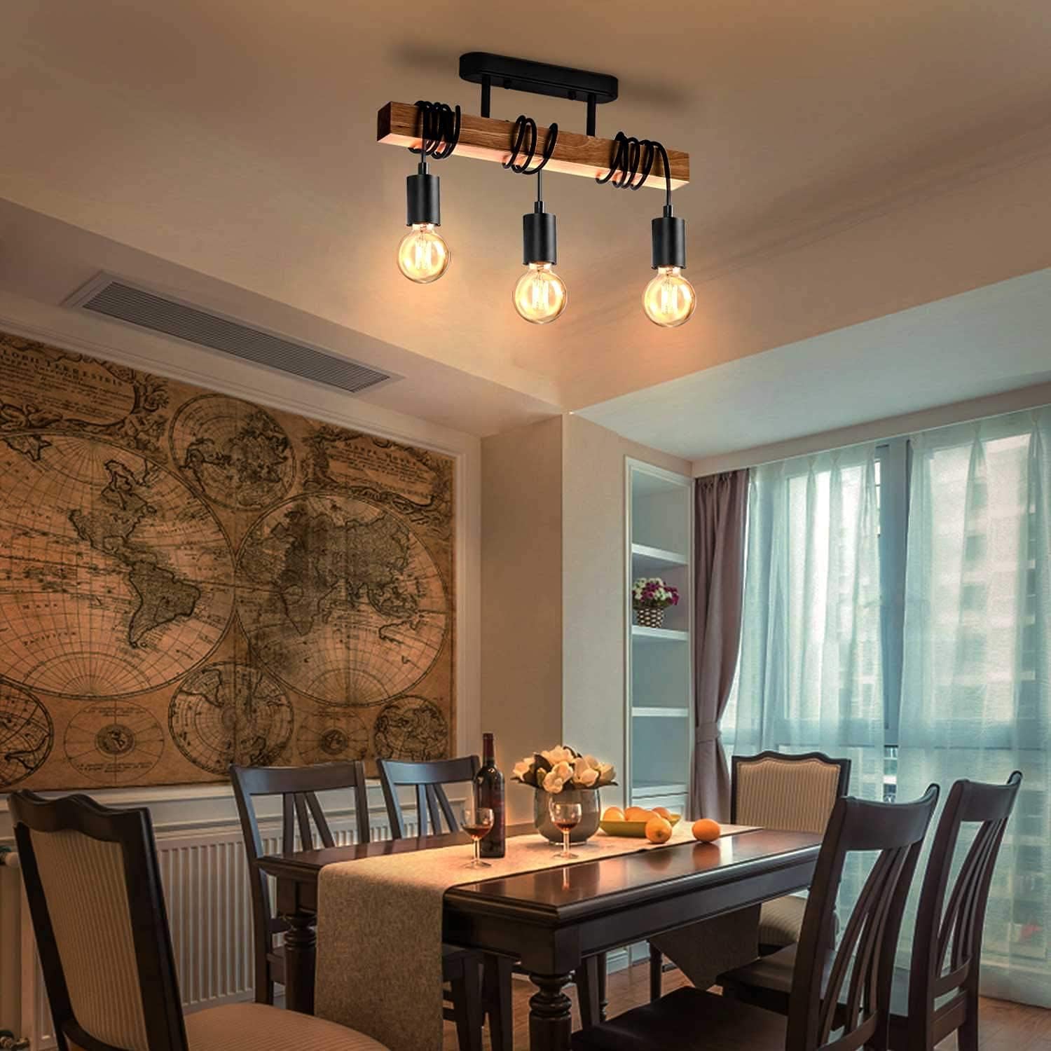 Dining room with a wooden ceiling light fixture, table, chairs, and decorative elements.