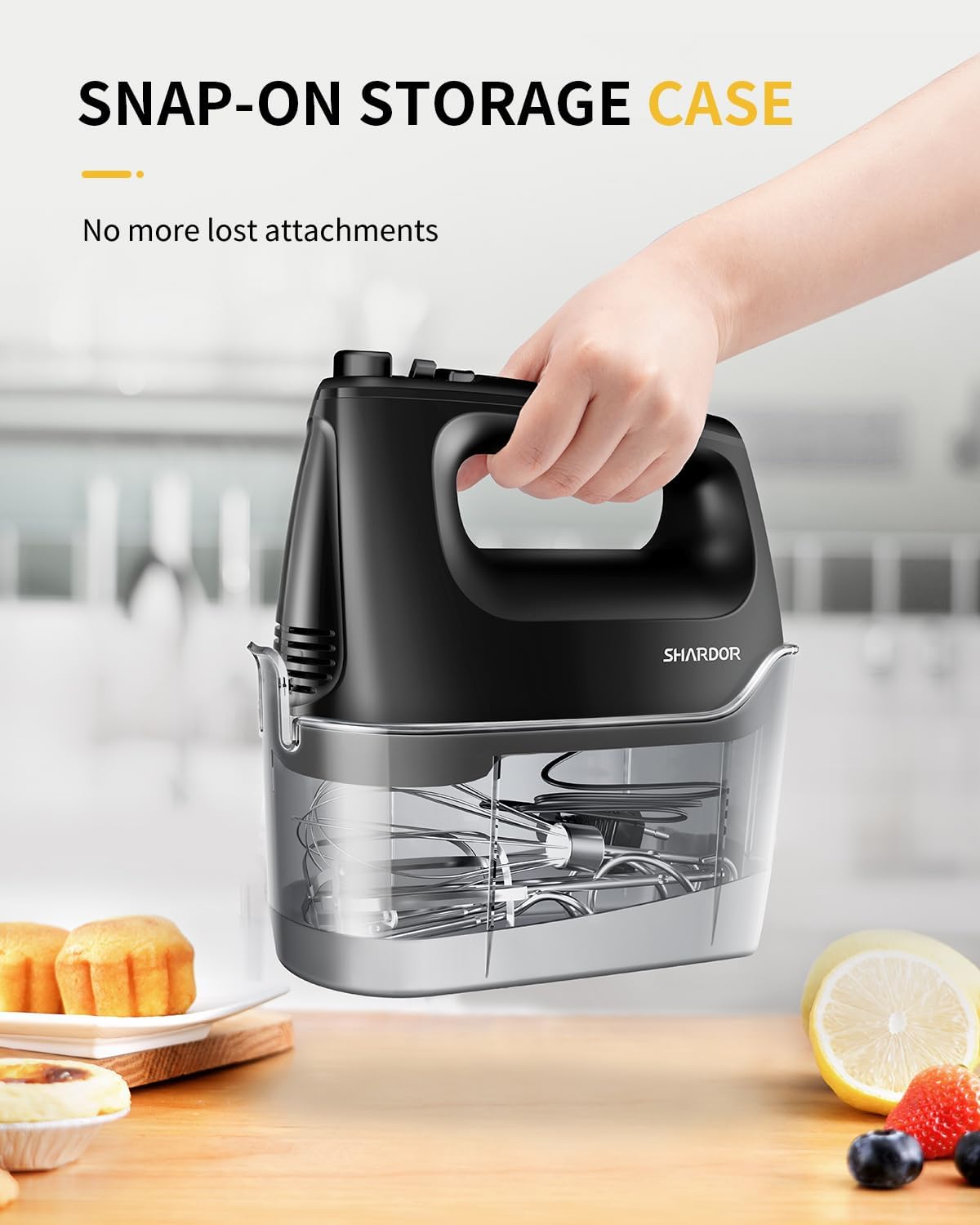 Handheld kitchen mixer with snap-on storage case on a kitchen counter.