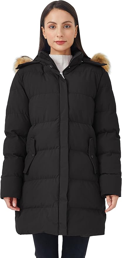 Woman wearing a black puffer coat with fur-lined hood on a white background