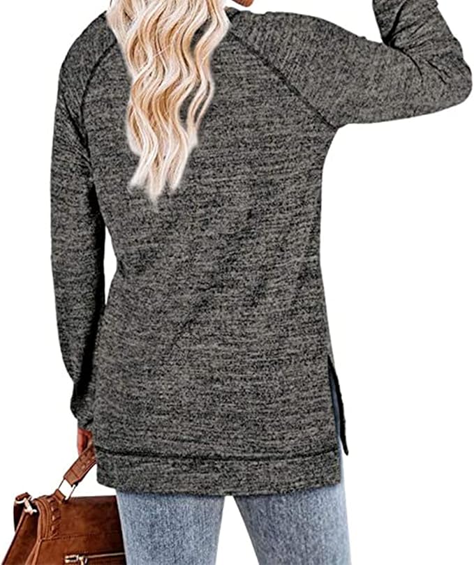 Gray sweater worn by a person with blonde hair, on a white background
