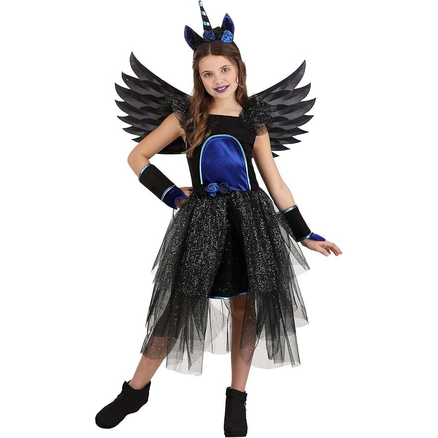 Child wearing a black and blue butterfly costume with wings on a white background