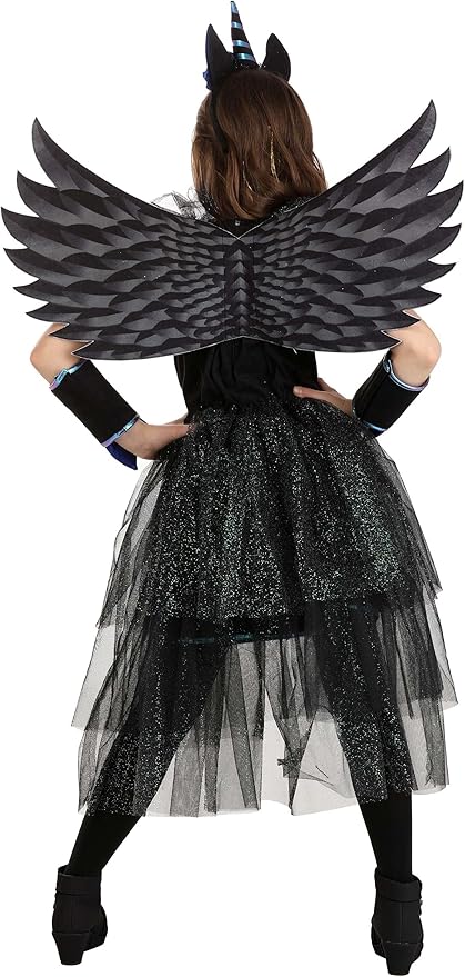 Person wearing a black and gray winged costume with a white background
