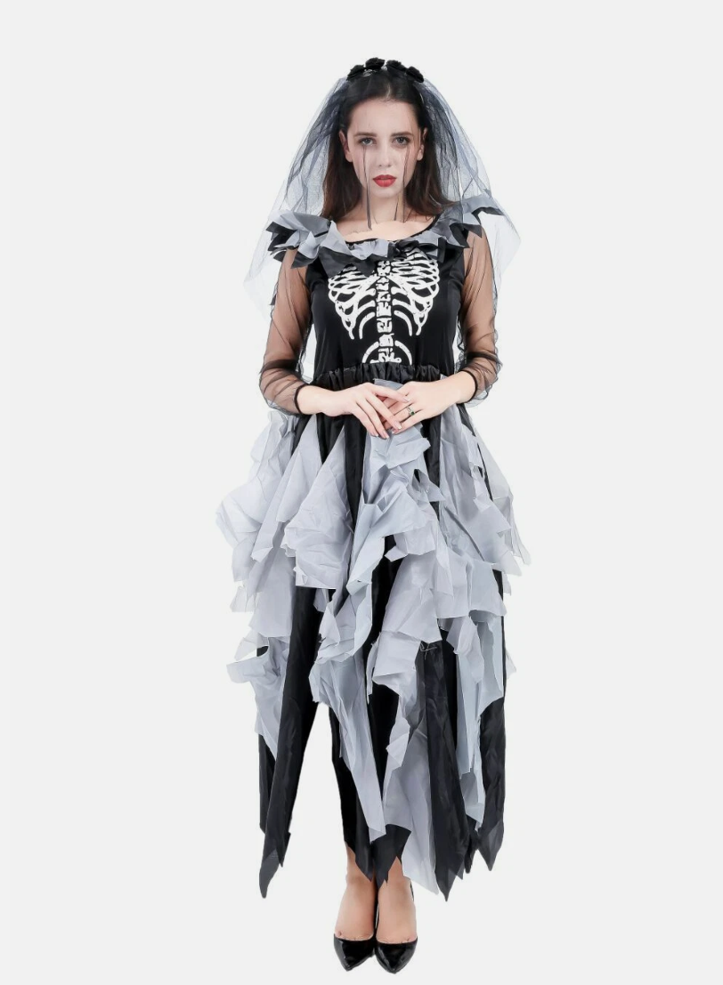 Woman wearing a Halloween costume with a skeleton design and sheer overlay on a white background