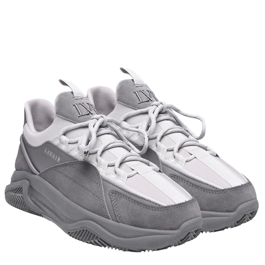 Gray and white sneakers with 'LVMH' branding on a white background