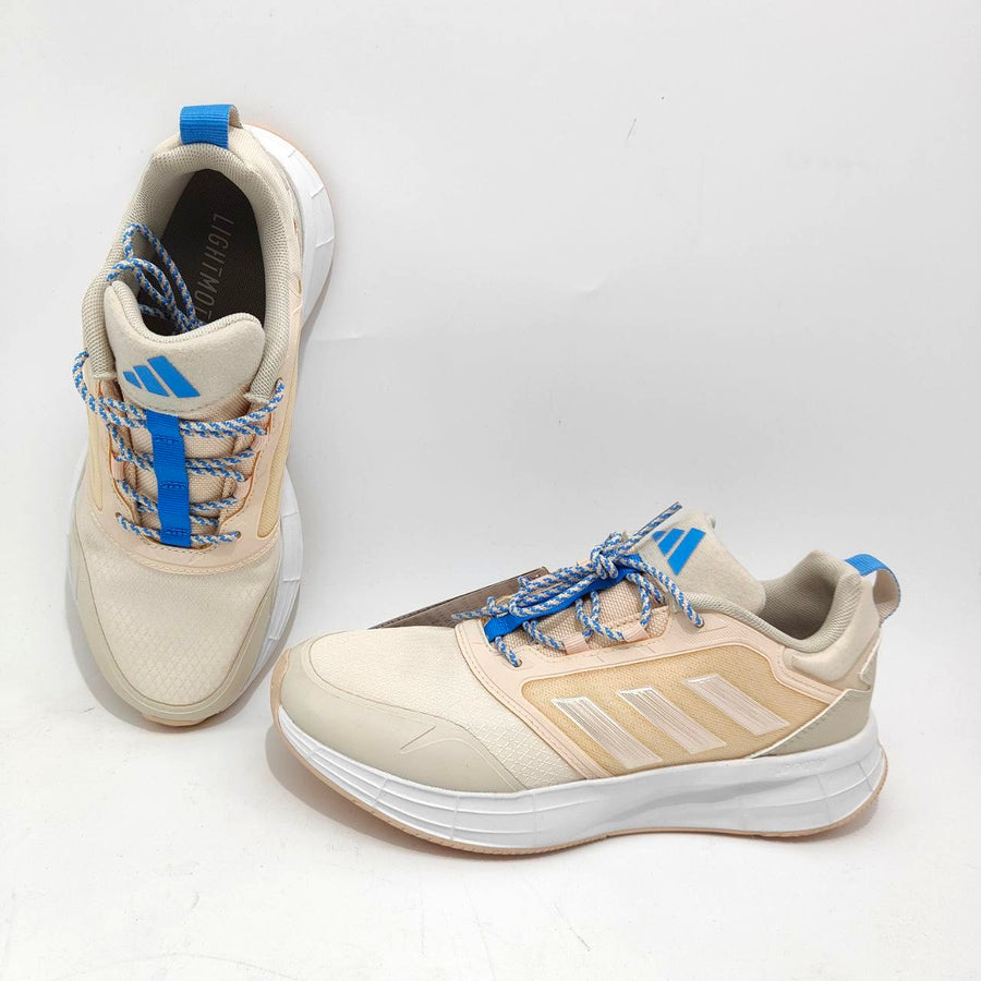 A pair of Adidas Duramo Protect running shoes with beige textile mesh uppers, blue lace loops, and a white rubber sole.