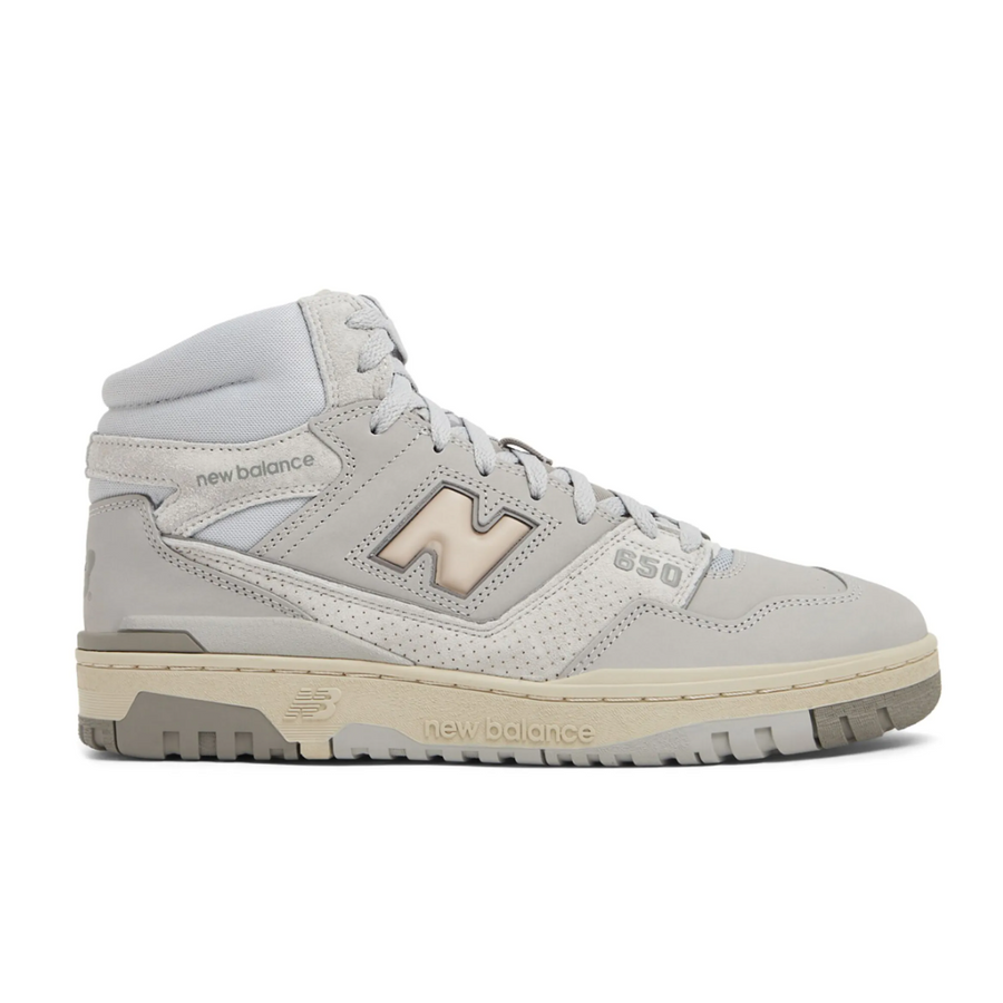 A pair of New Balance 650 high-top sneakers in light grey and beige, size UK 6.5 / EU 40, with no original packaging.