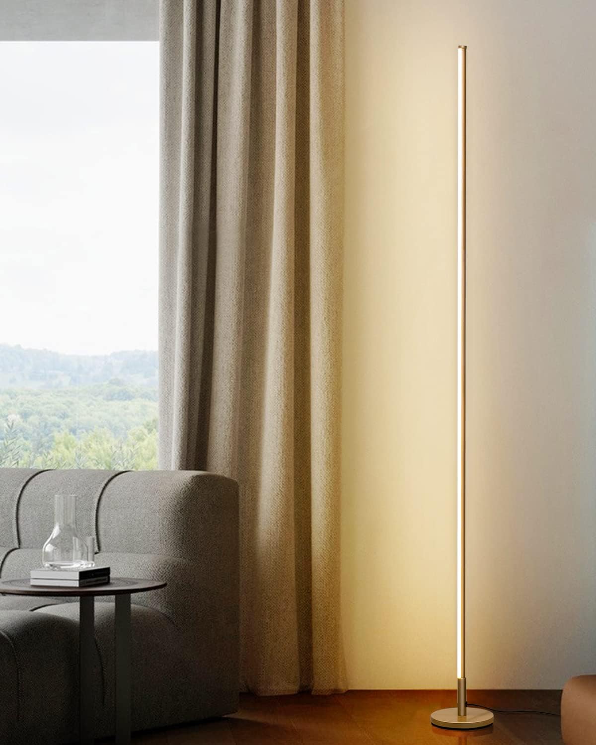Modern floor lamp next to a window with curtains in a living room setting