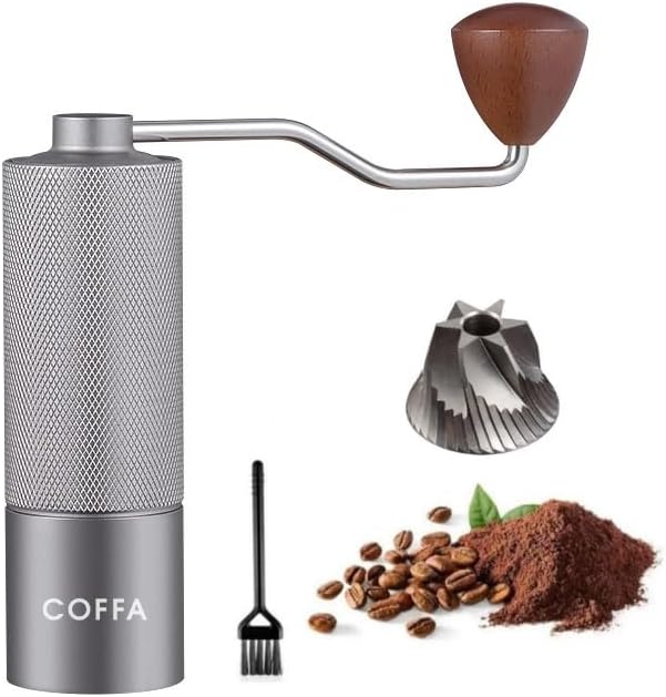 Hand coffee grinder with attachments and coffee beans and powder on a white background