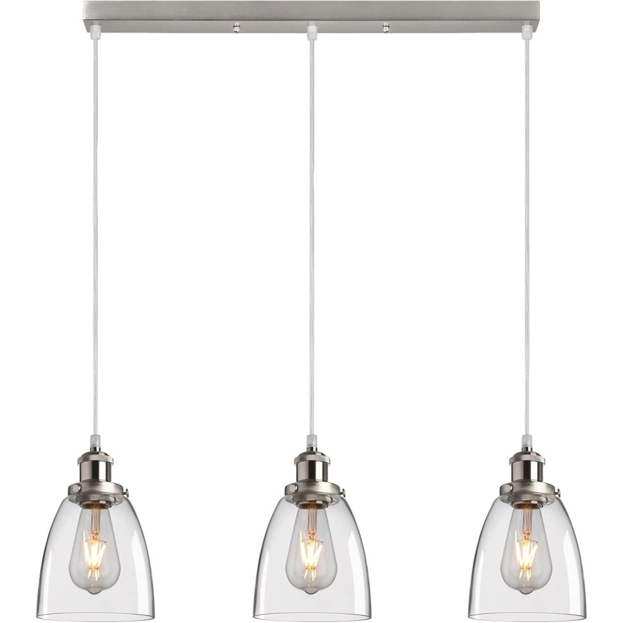 Three pendant lights with clear glass shades on a white background