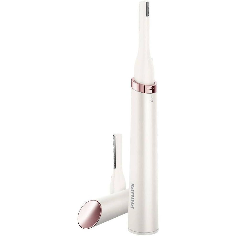 White and rose gold electric toothbrush on a white background