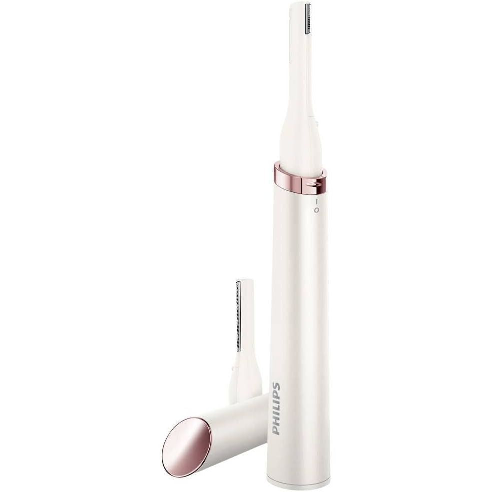 White and rose gold electric toothbrush on a white background