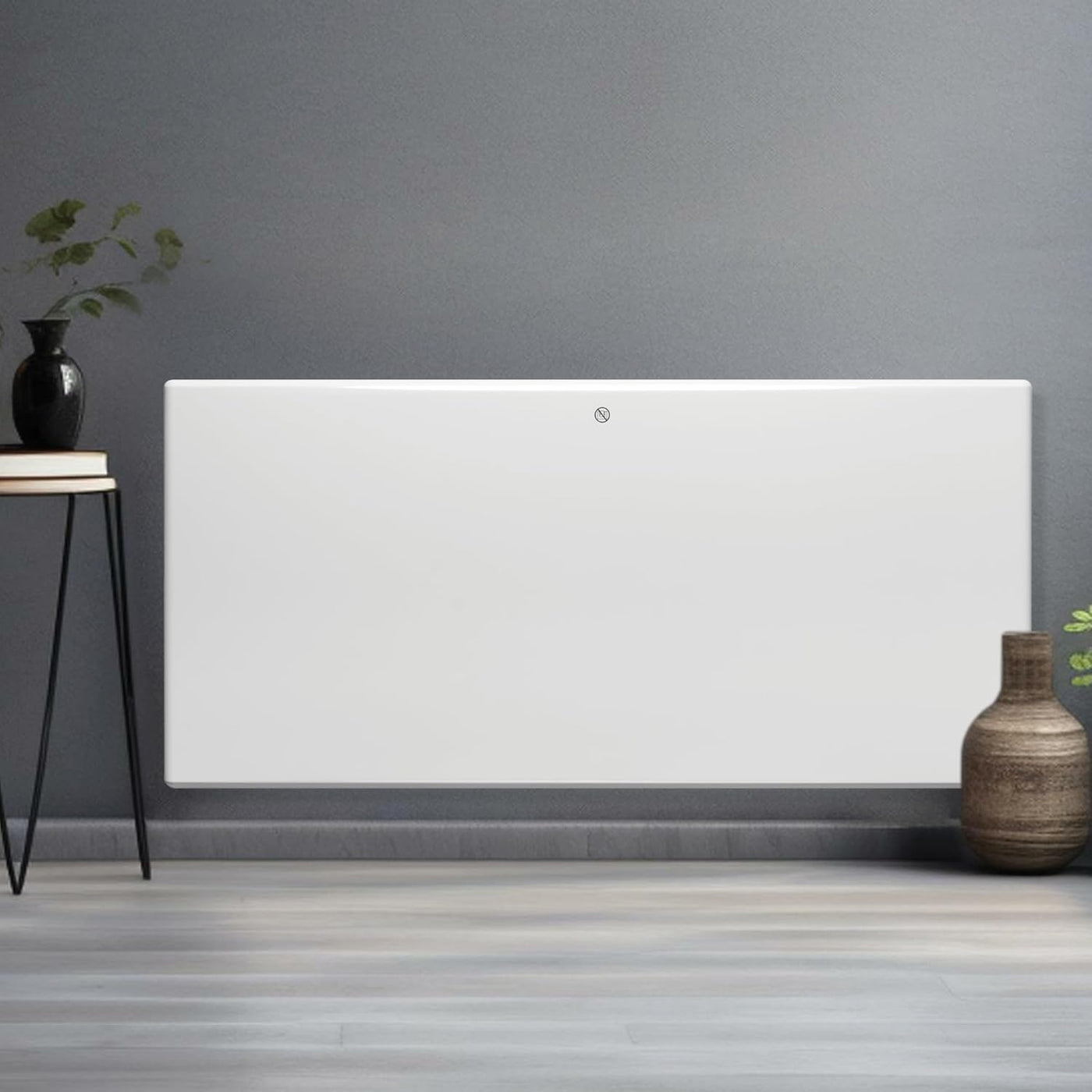 White wall-mounted panel against a gray wall with decorative vases on either side.
