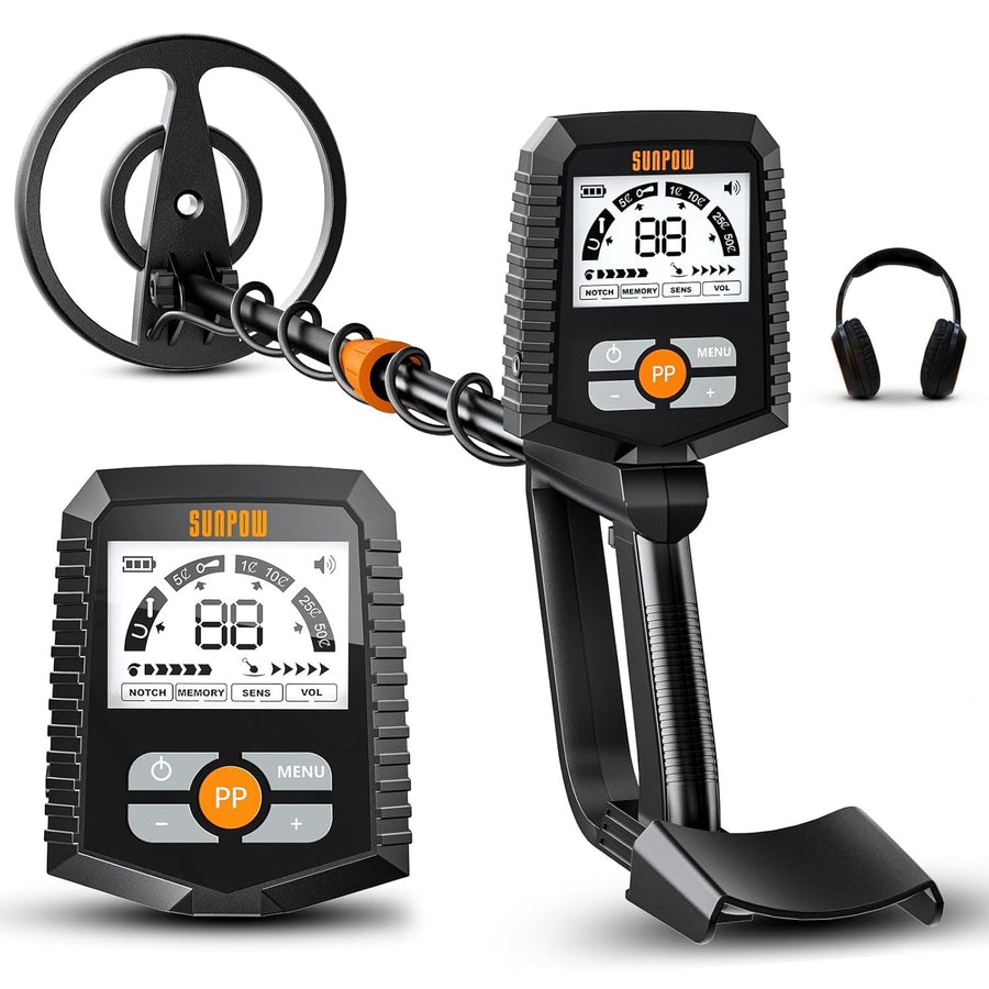 Metal detector with headphones and batteries on a white background