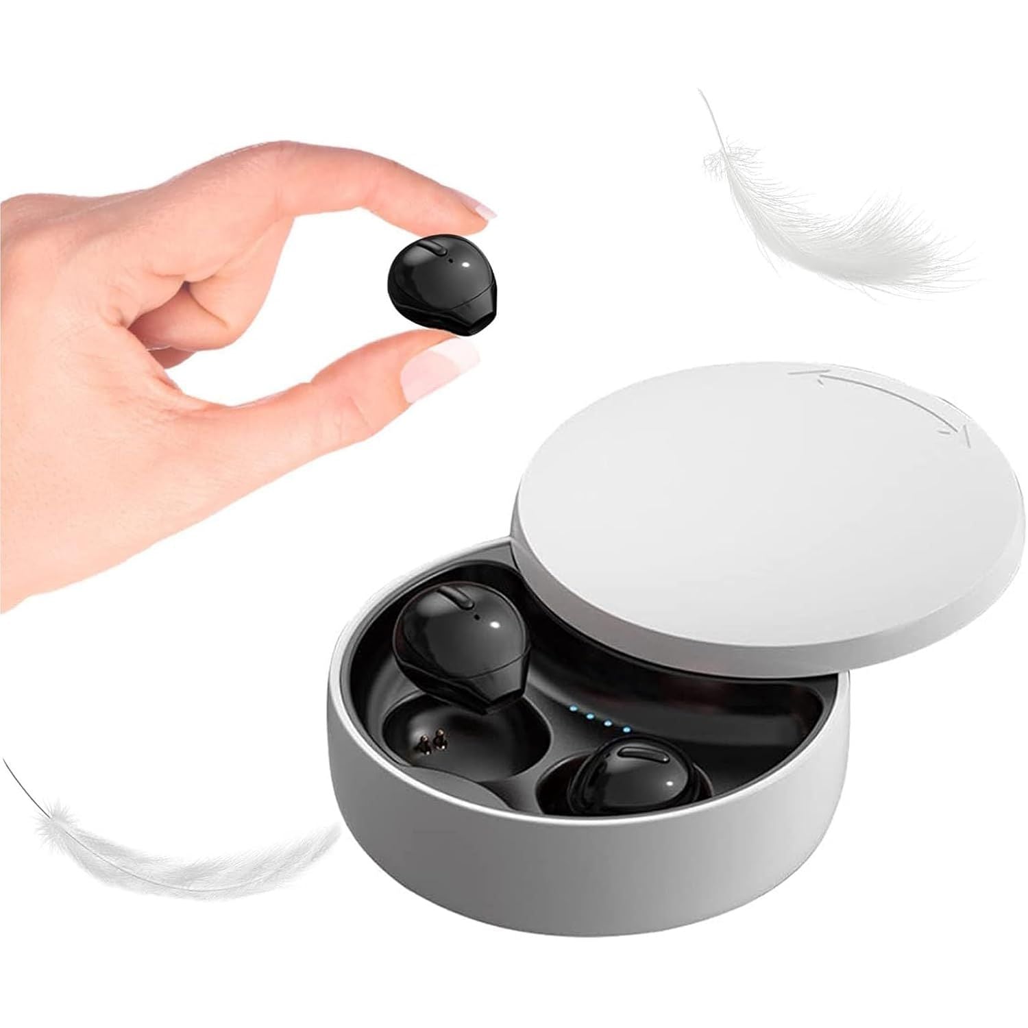 Black wireless earbuds in a white charging case held by a hand on a white background