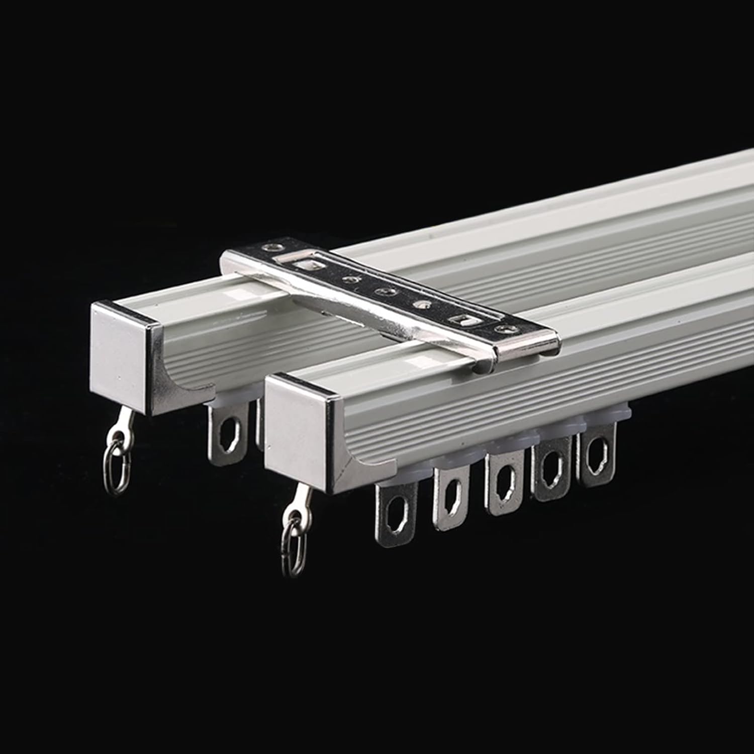 Metallic ladder with rungs on a black background