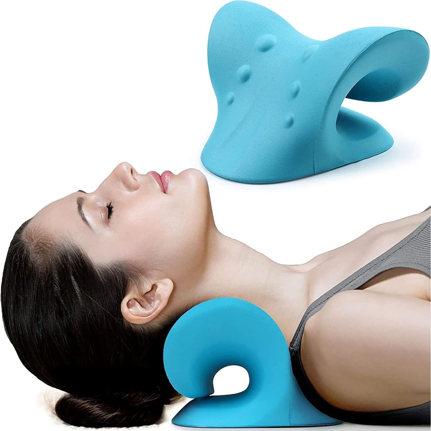 Woman using a blue neck and shoulder massager on a white background