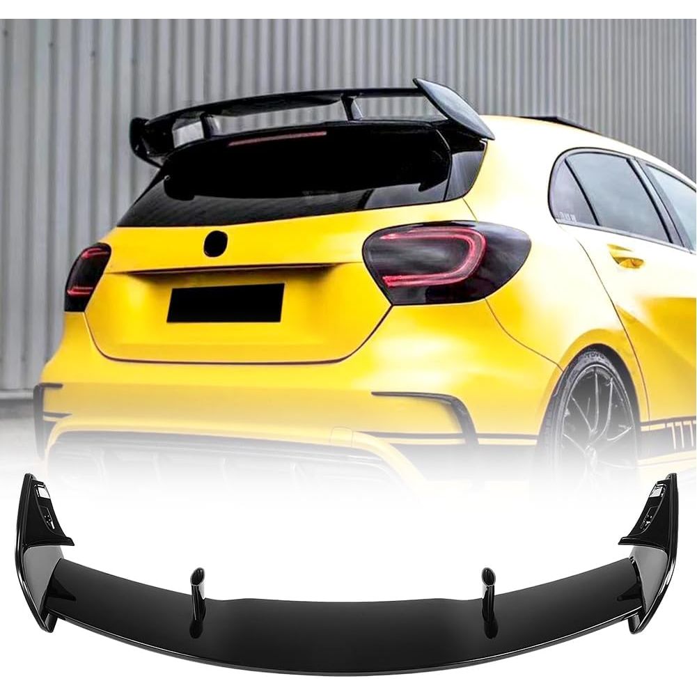 Yellow car with a black rear wing on a white background
