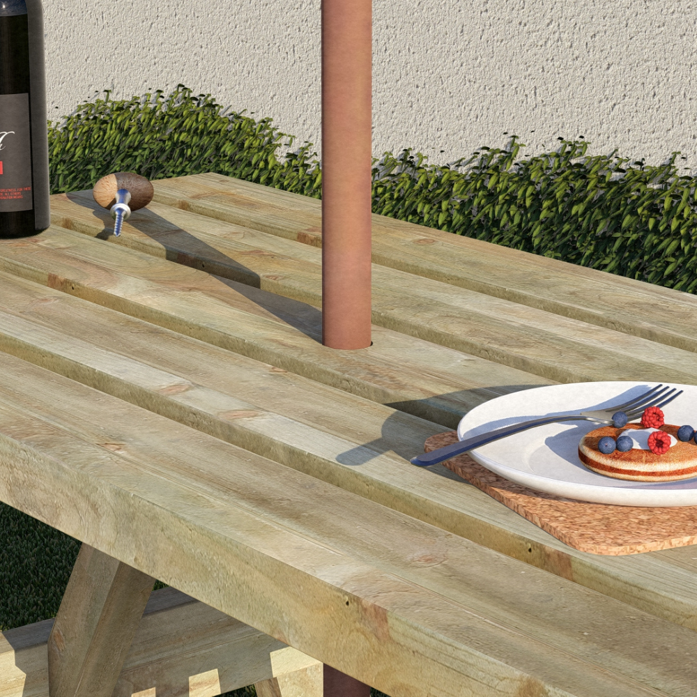 Wooden outdoor table with a plate of food, cutlery, and a bottle of wine on a patio.