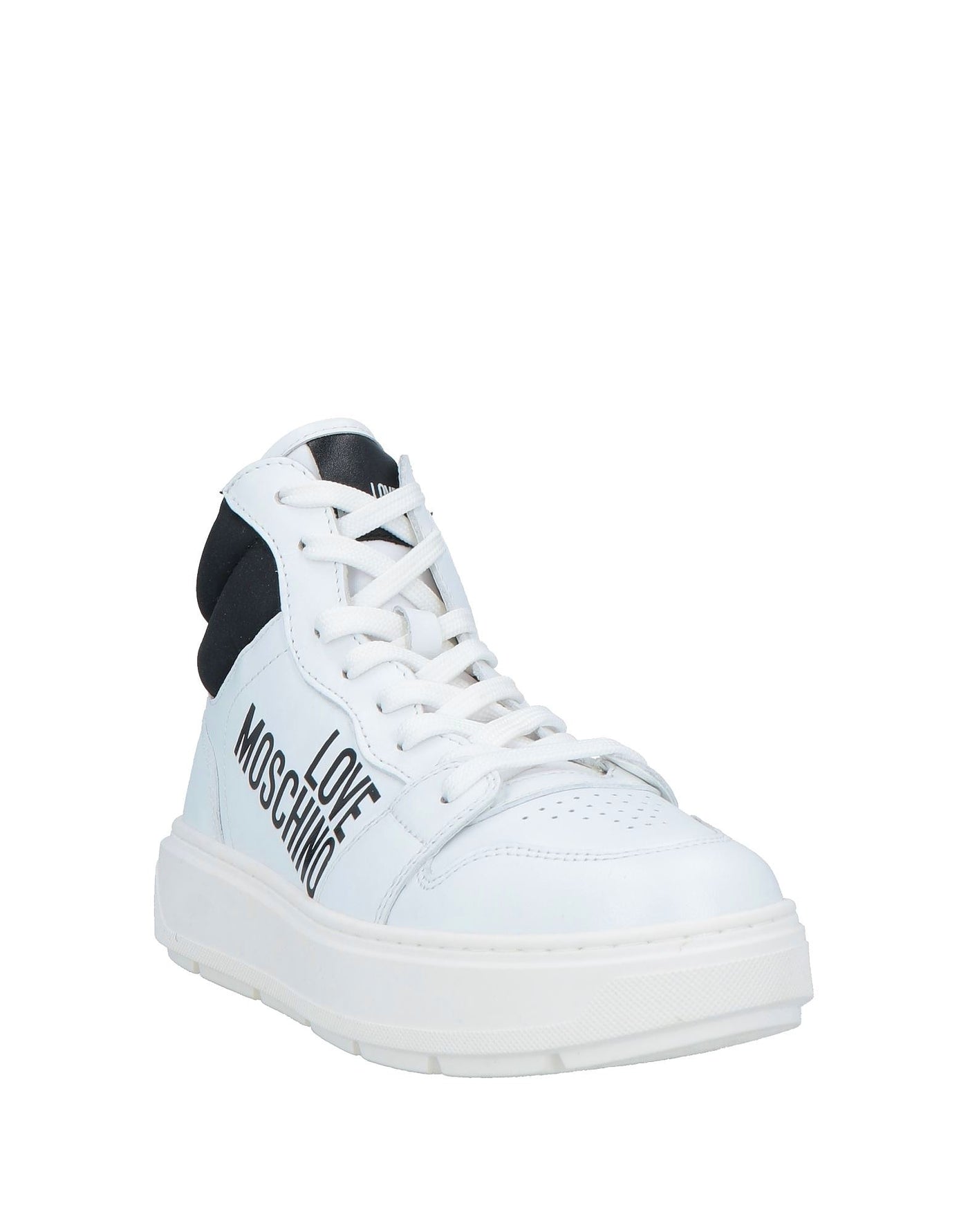 White sneaker with black text on a white background