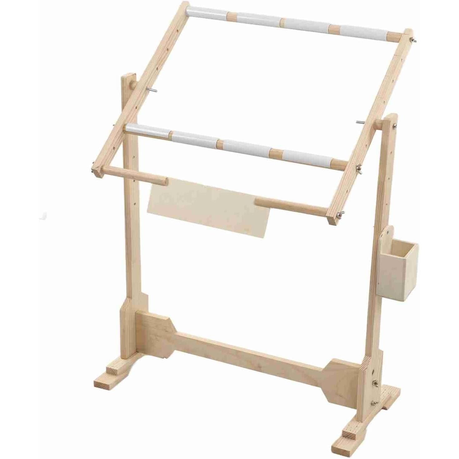 Wooden quilting frame with white bars on a white background