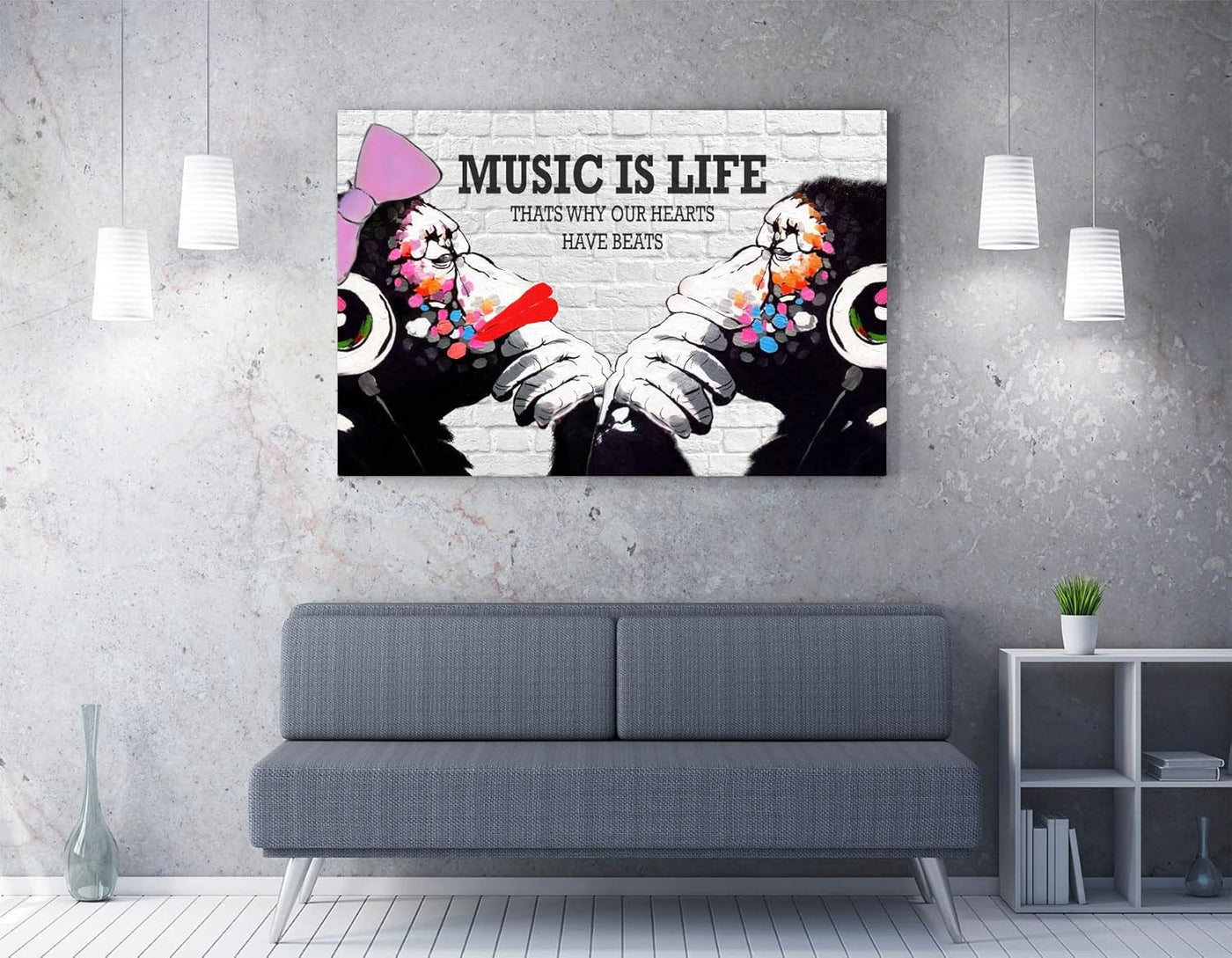 Canvas print with 'Music is Life' design above a sofa in a living room.