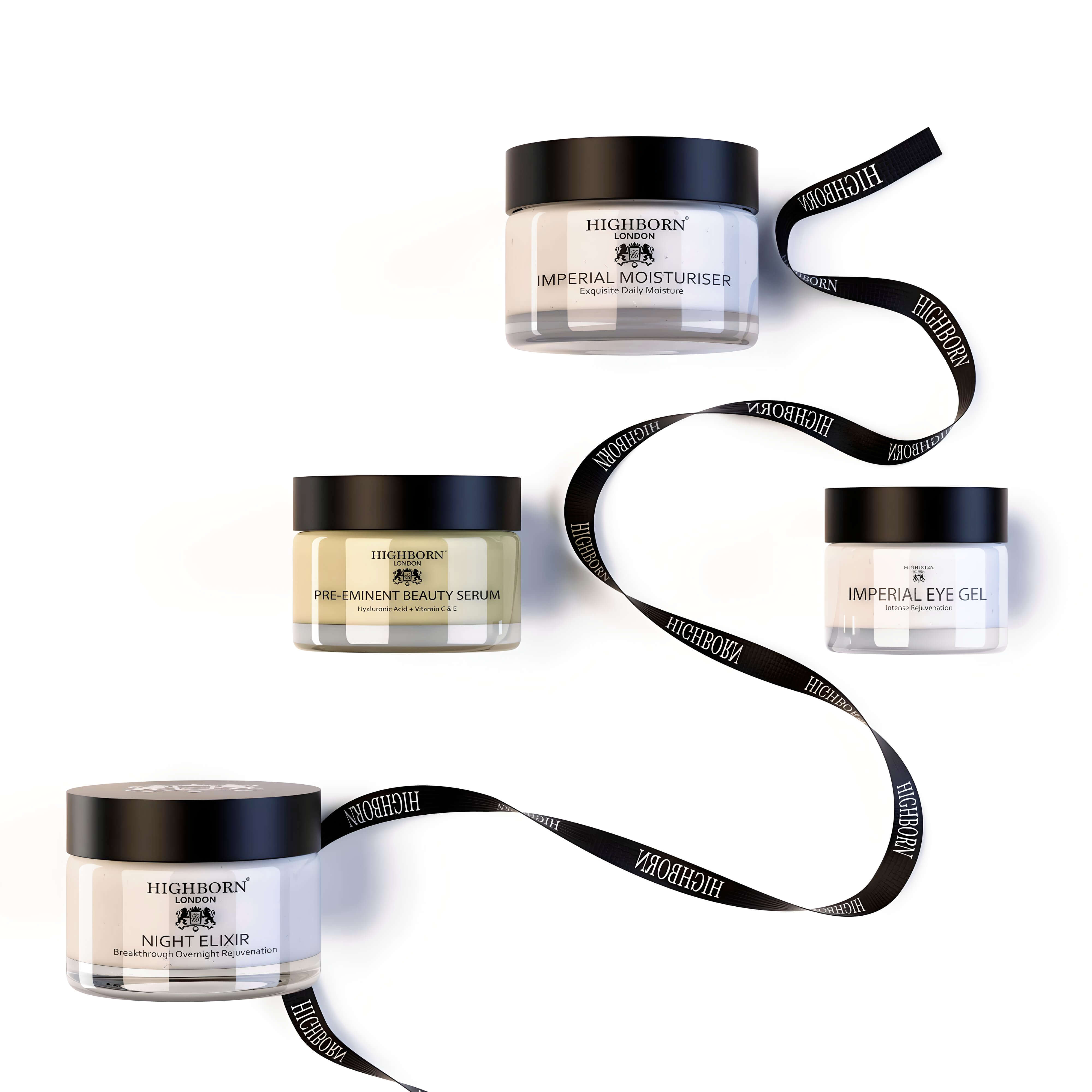 Set of Highborn skincare products including jars and a ribbon on a white background