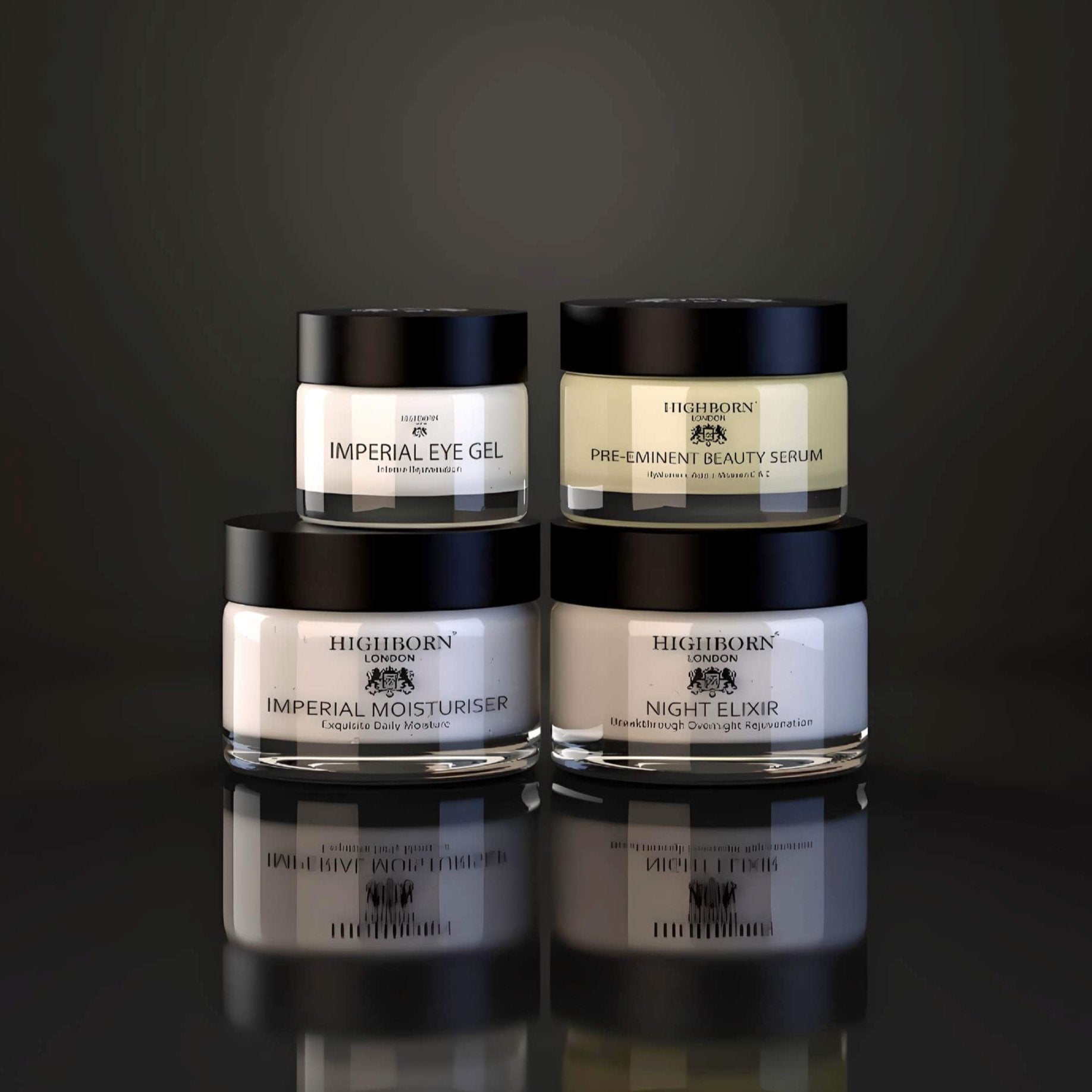 Four Highborn skincare jars stacked on a reflective surface with a dark background