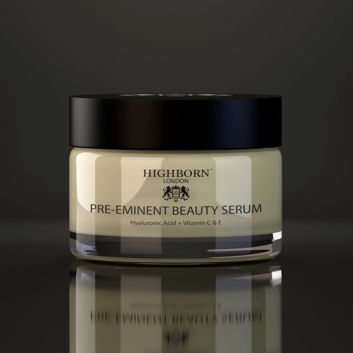 Highborn Pre-Eminent Beauty Serum jar on a reflective surface with a dark background