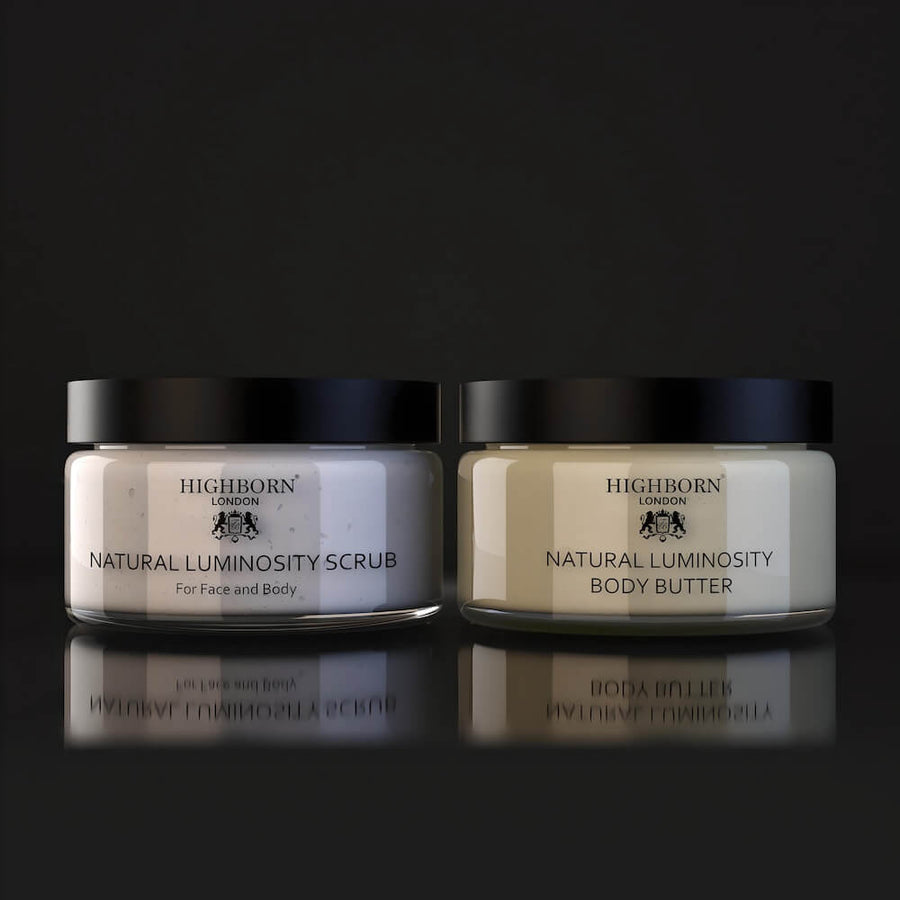 Two jars of Highborn London Natural Luminosity Scrub and Body Butter on a black background