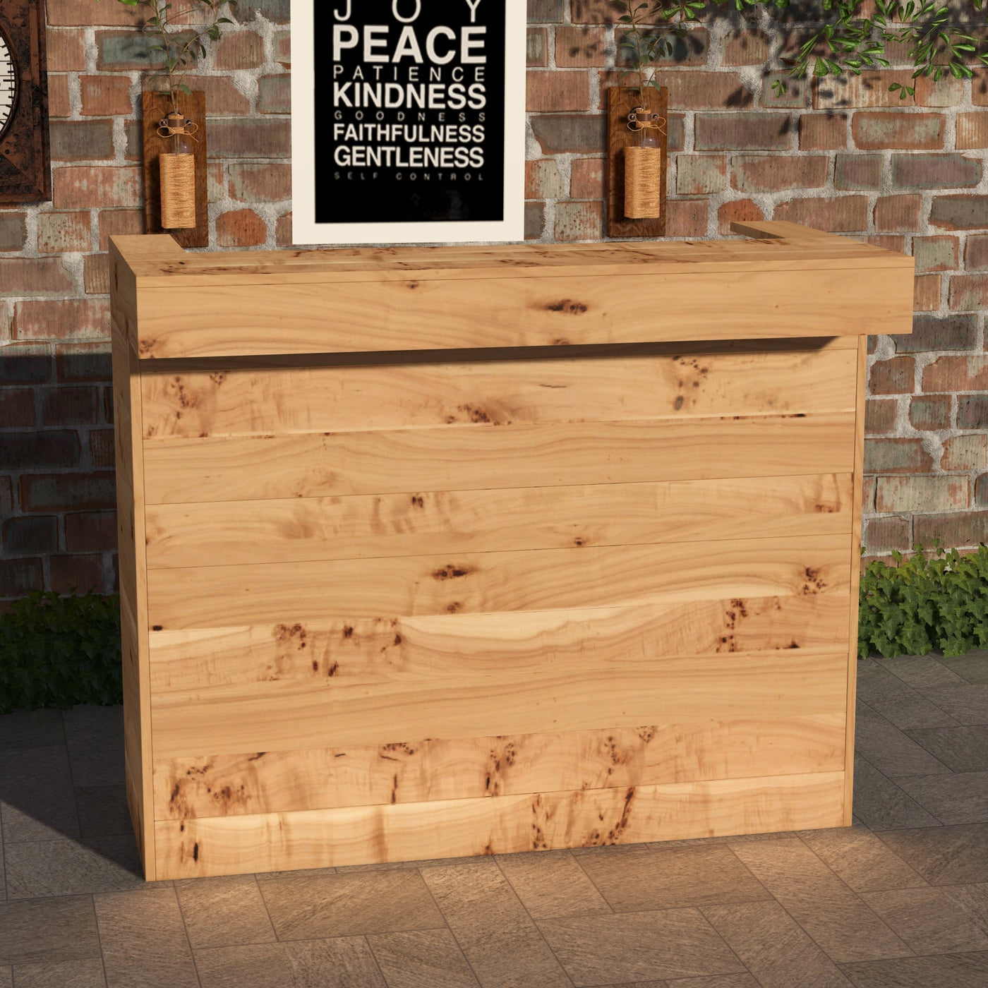 Wooden planter box against a brick wall with a framed quote above it.