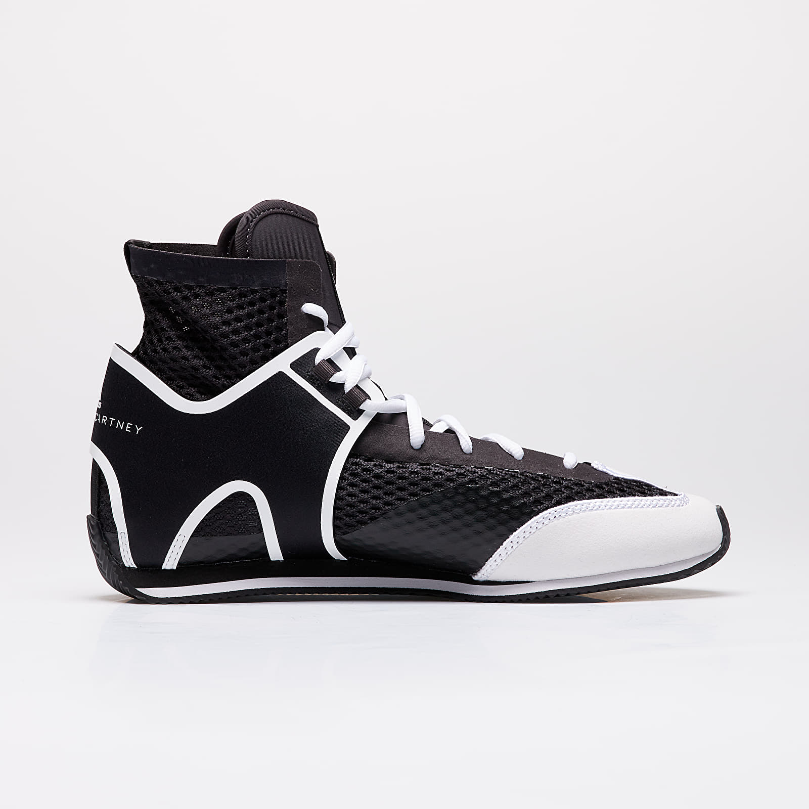 A pair of Adidas Performance X Stella McCartney walking/running shoes in black and white color.