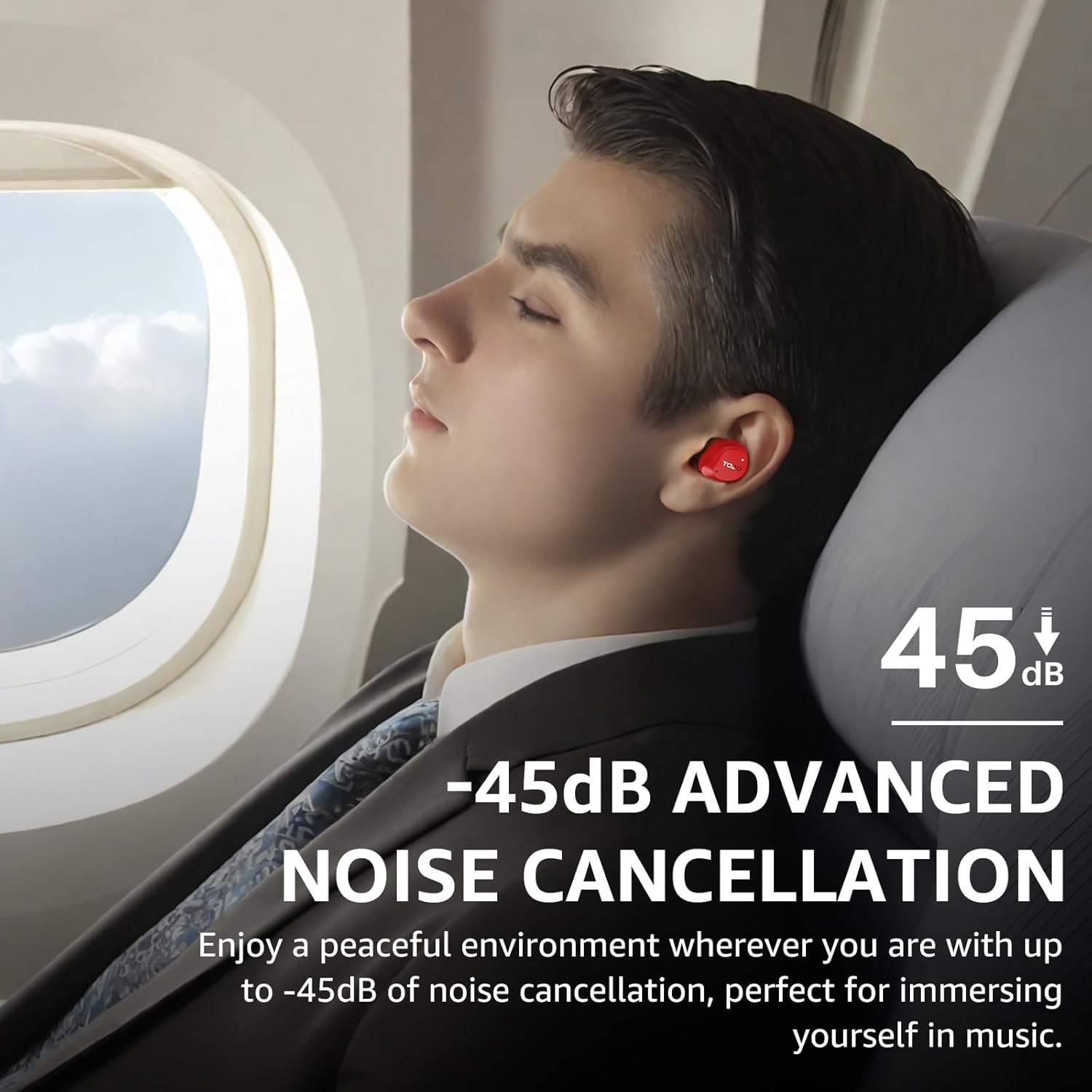 Person on an airplane with noise-cancelling headphones, window in background