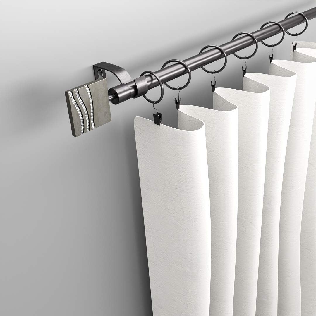 Curtain rod with decorative bracket and white curtains on a plain background