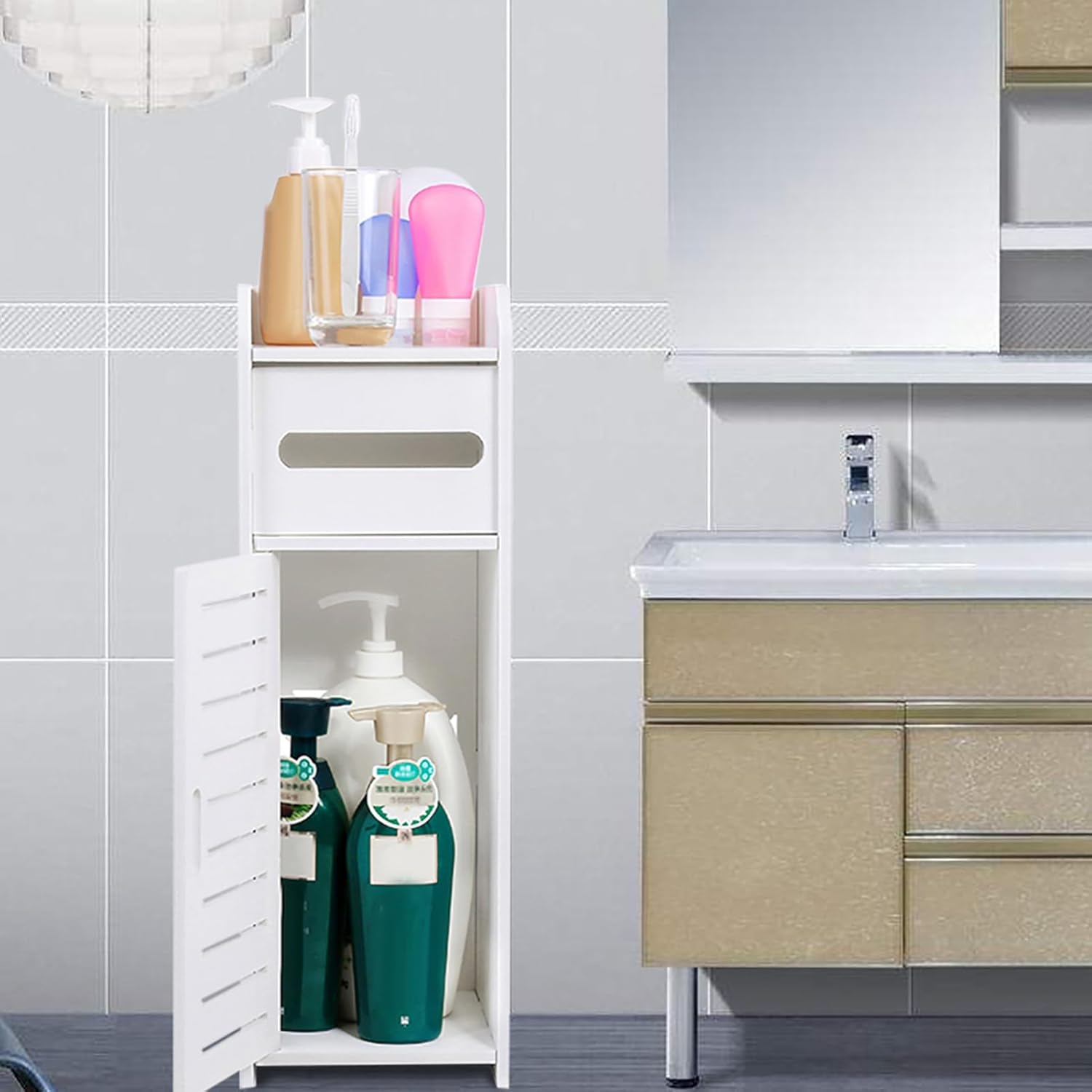 Bathroom with a white cabinet against a tiled wall, containing various bottles and a sink.