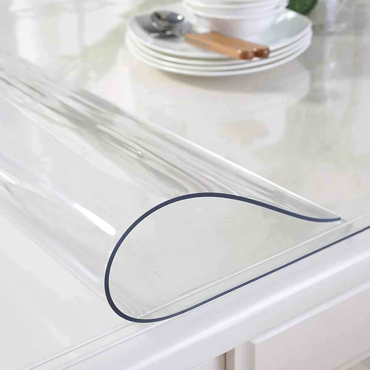 Clear tablecloth with blue edge on a white table