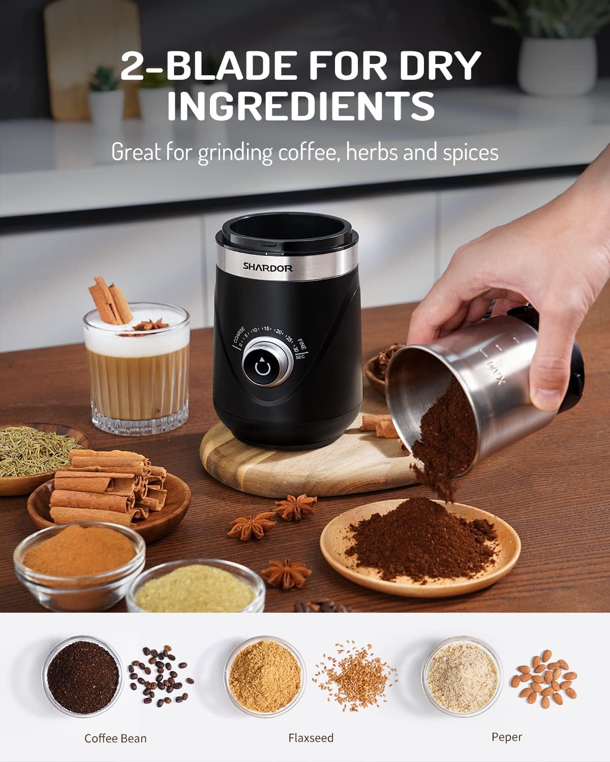 Black handheld blender with ingredients on a wooden surface, labeled for dry ingredients.