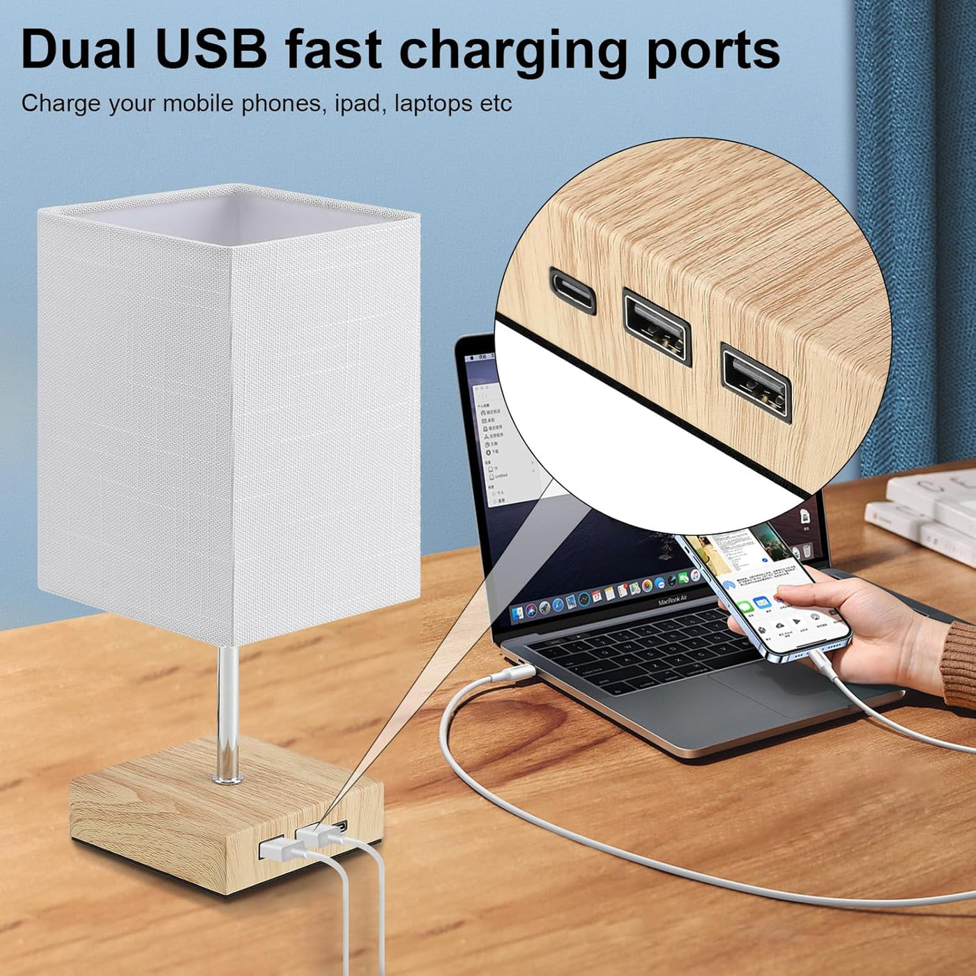 Wooden desk lamp with dual USB charging ports on a desk with electronic devices.