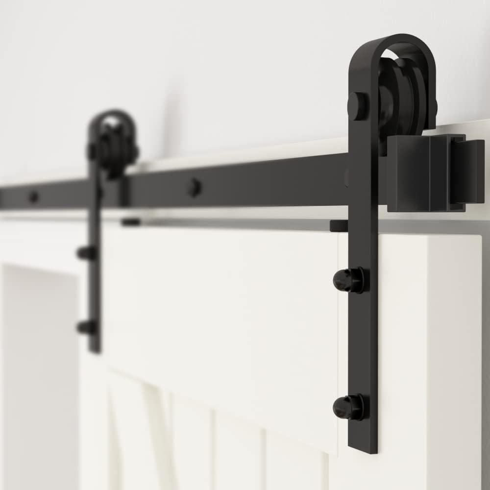 Black sliding door hardware system on a white background