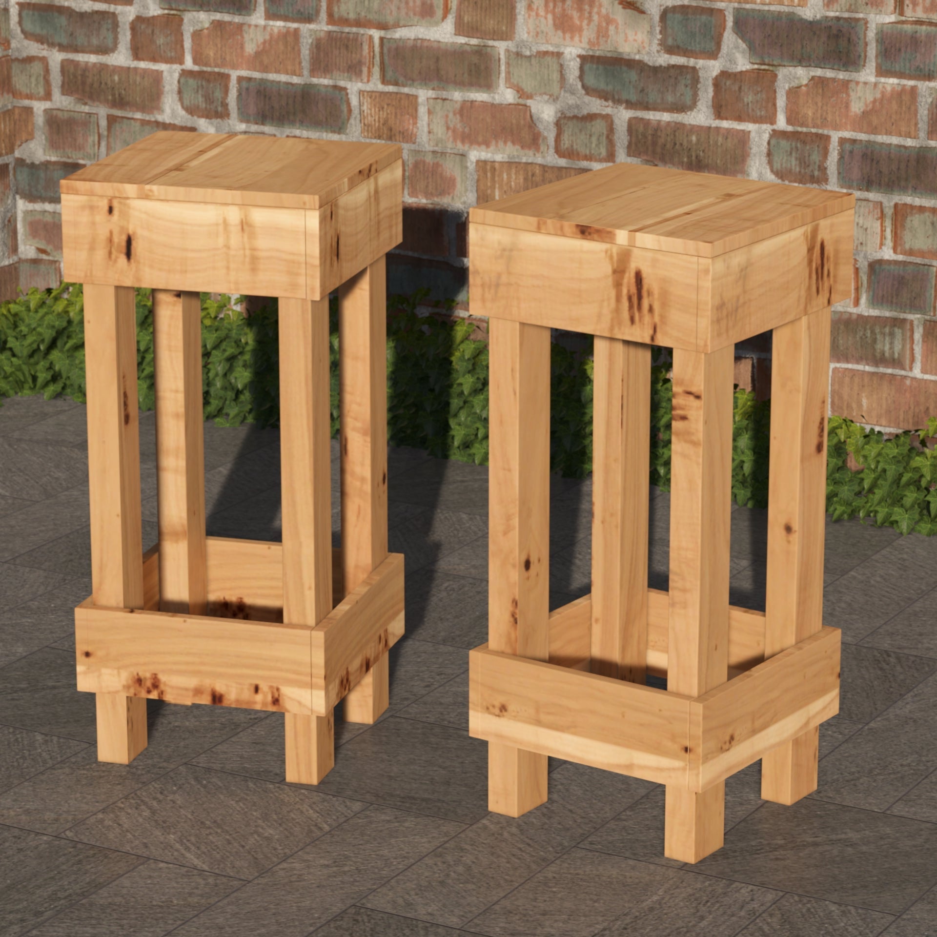 Two wooden stools against a brick wall.