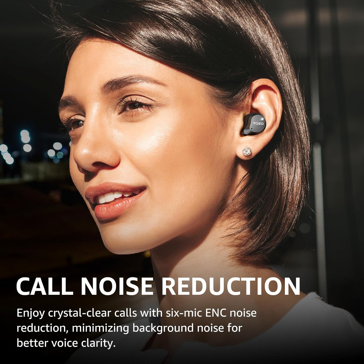 Woman wearing a wireless earbud with text about call noise reduction.