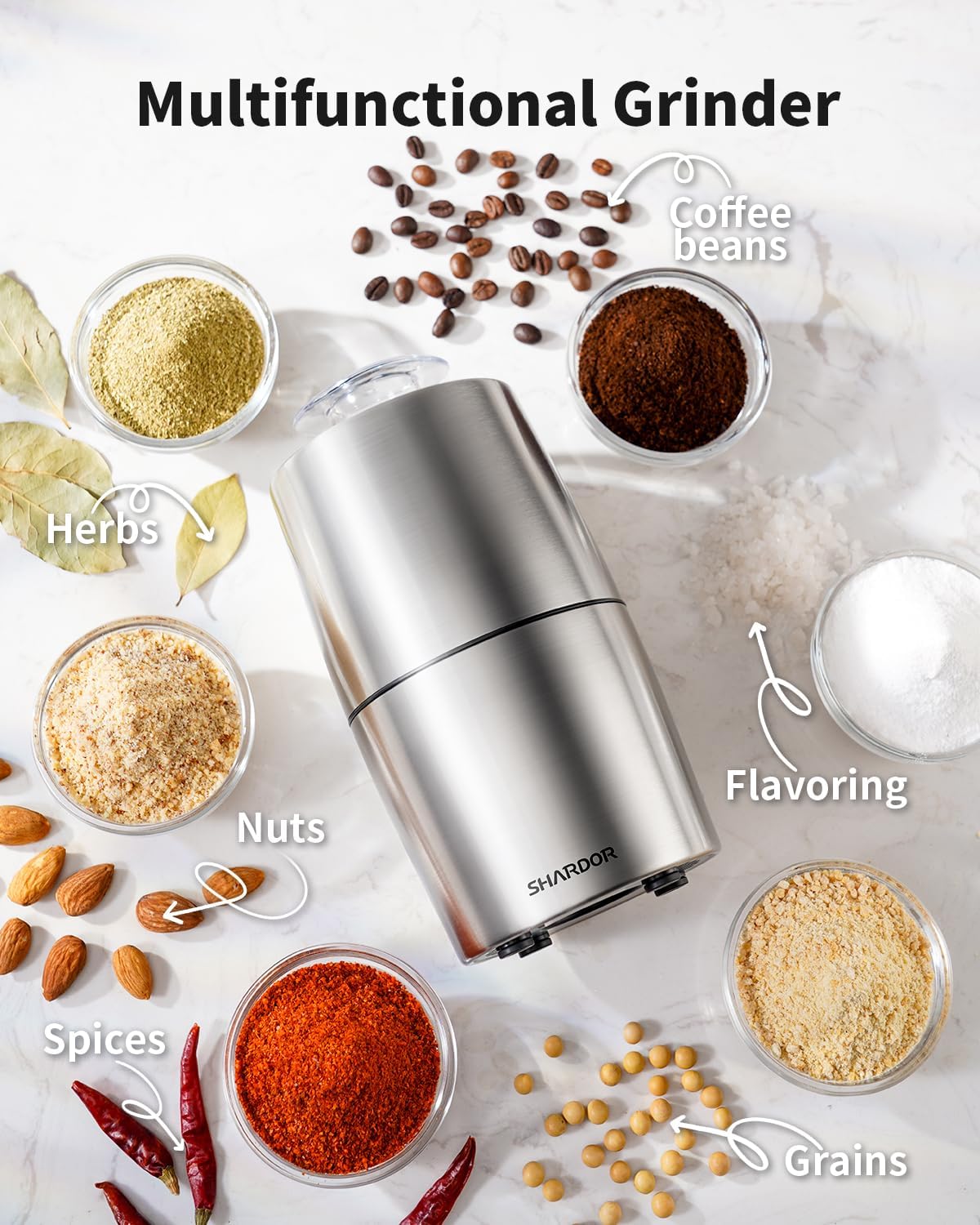Multifunctional grinder with various food items around it on a light background