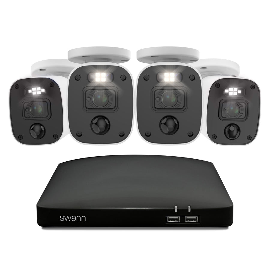 Swann security camera system with four cameras and a DVR on a white background