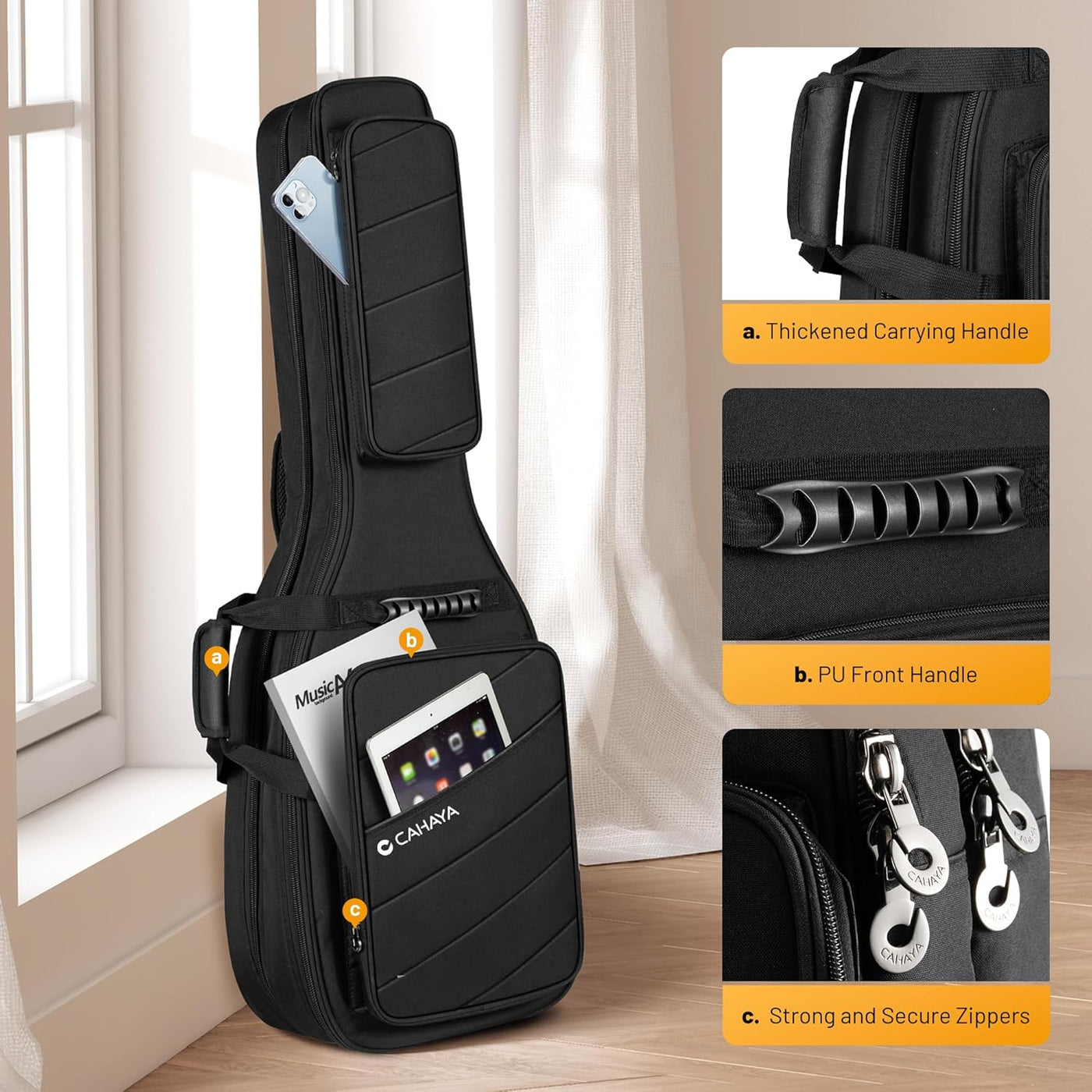 Black guitar case with features highlighted on a wooden floor.
