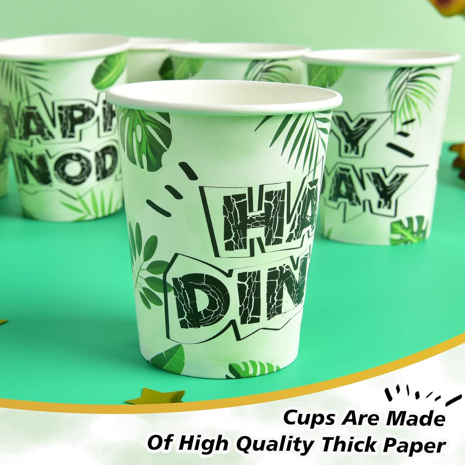 Green paper cups with black text and leaf patterns on a green background
