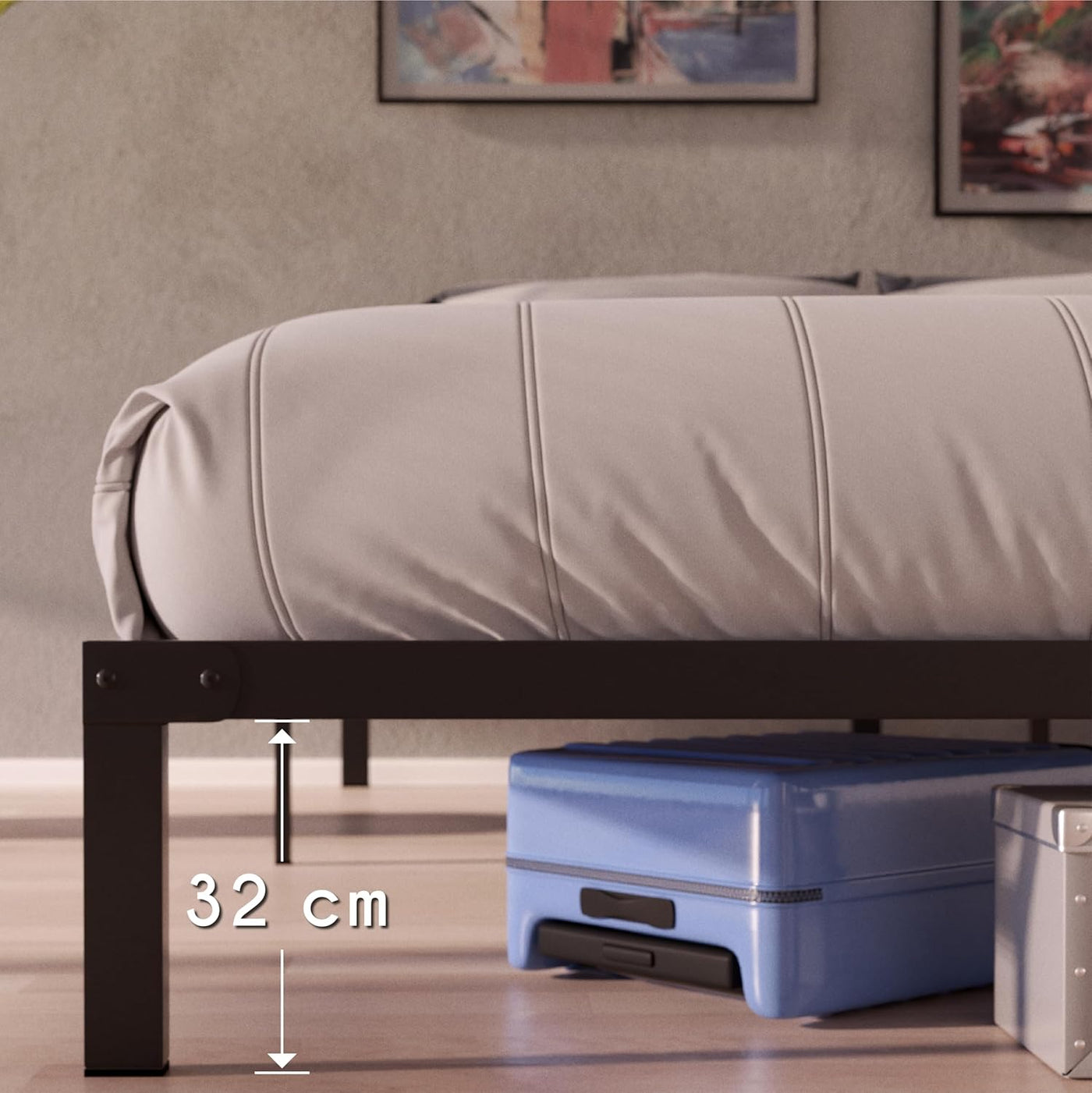 Gray sofa bed with a blue suitcase underneath, showing a measurement of 32 cm.