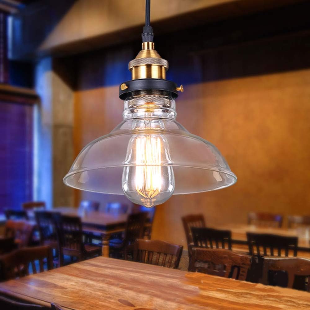 Vintage-style pendant light with clear glass shade in a restaurant setting