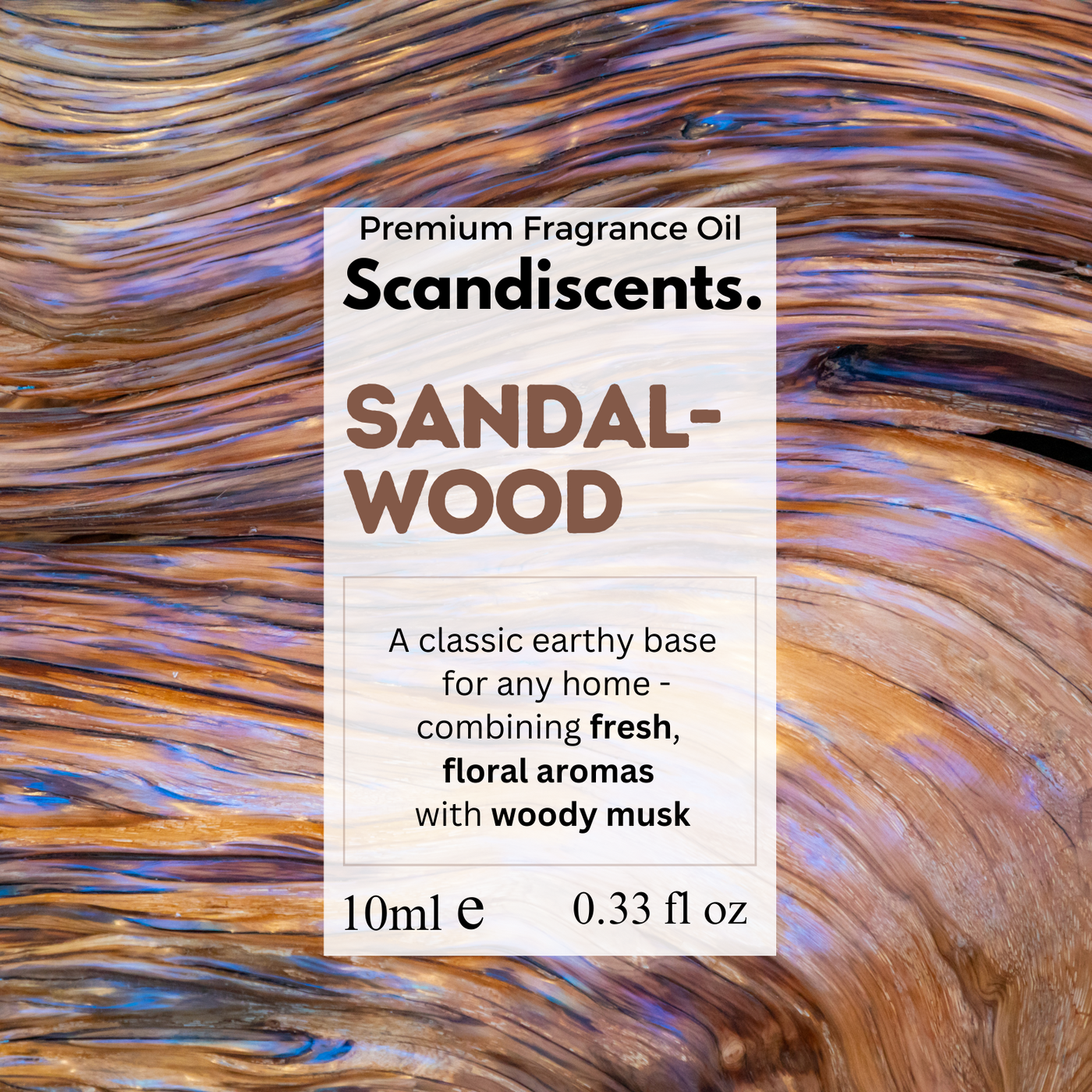 Scandiscents sandalwood fragrance oil packaging on a sandalwood background